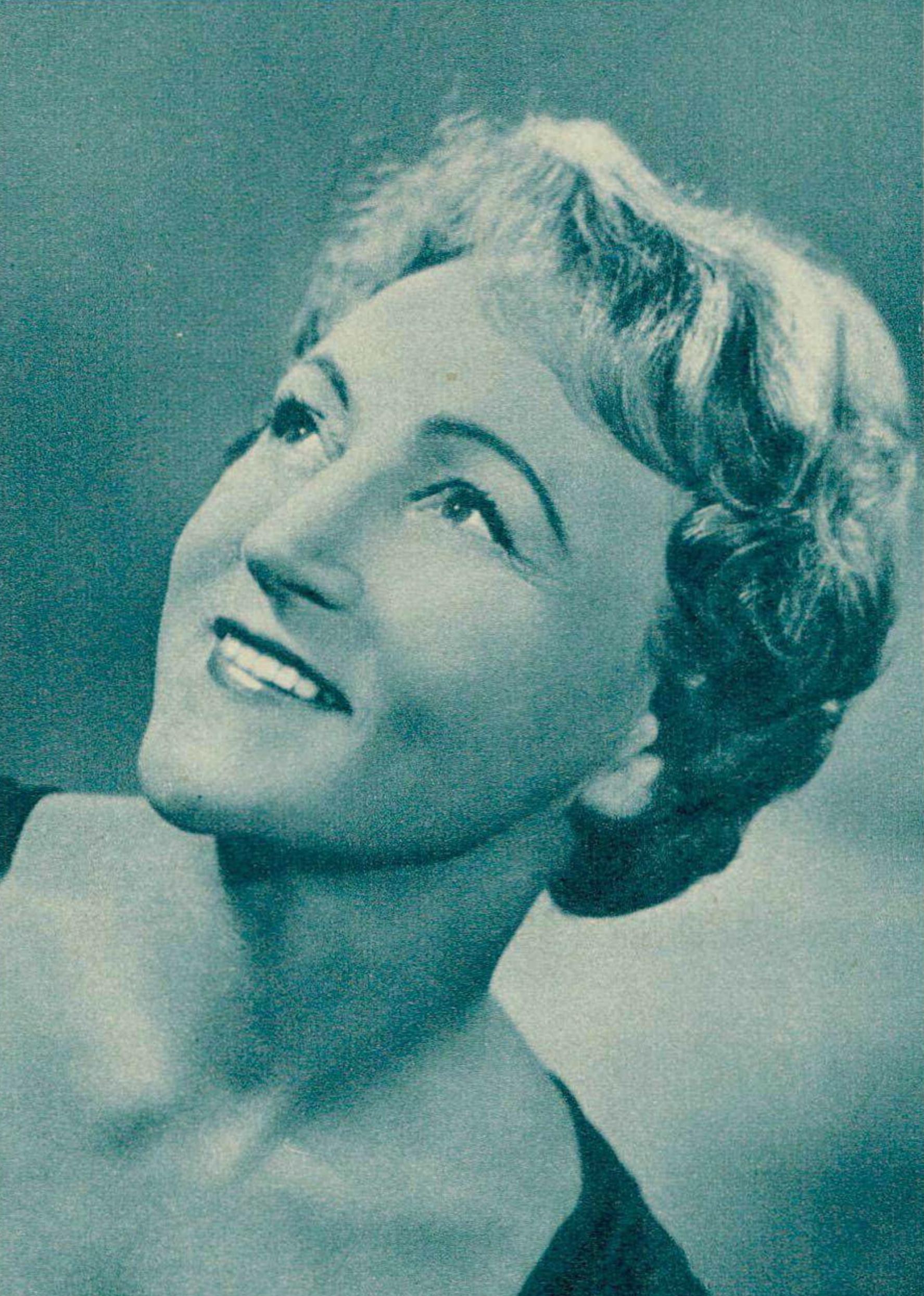 Flore WEND vers 1961, un portrait publié entre autres dans Radio Je vois tout TV du 27 avril 1961, No 17, page 18, cliquer pour une vue agrandie